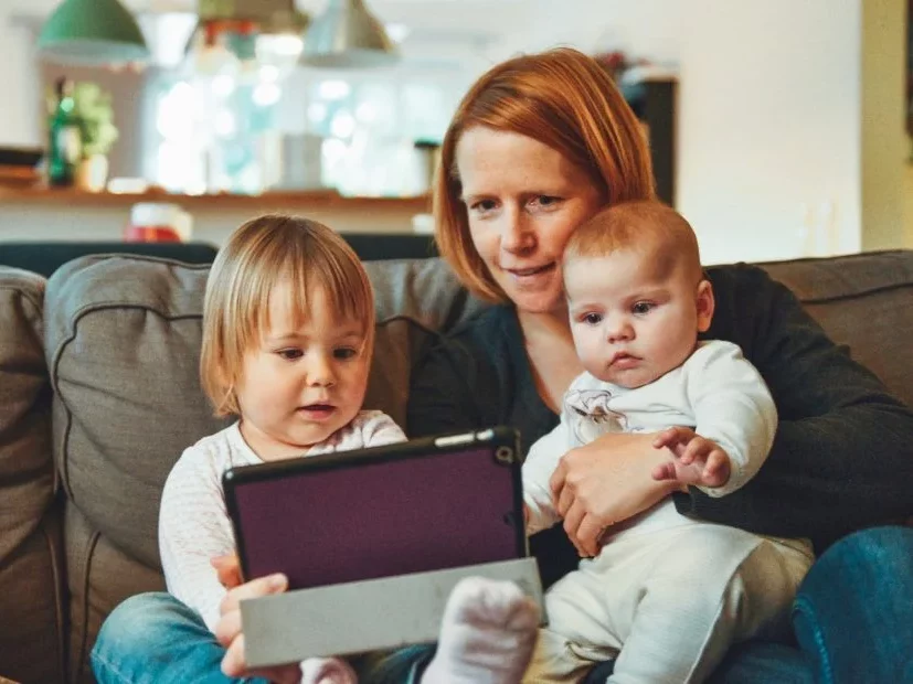 Mother and Children Watching a Tablet