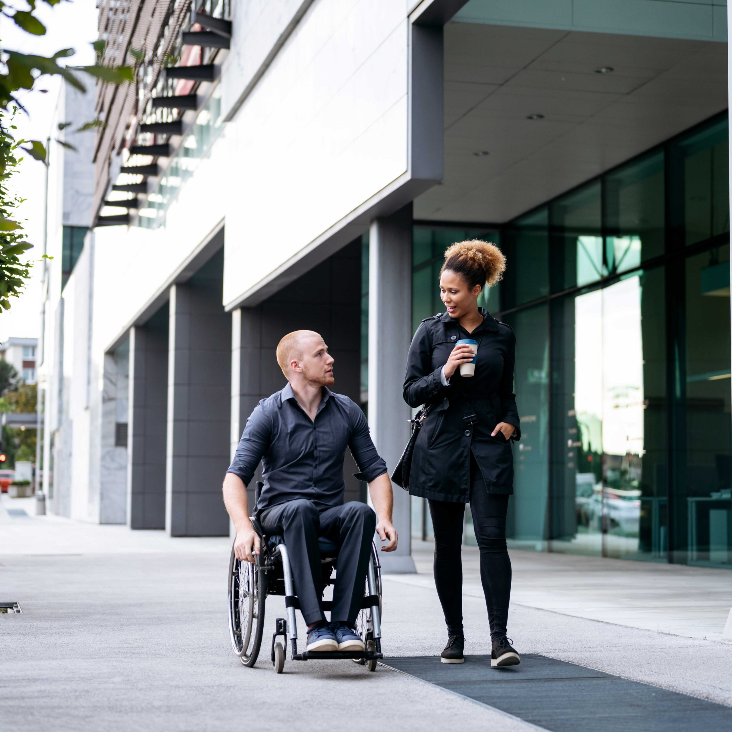 Two Friends Heading to Work Having a Chat