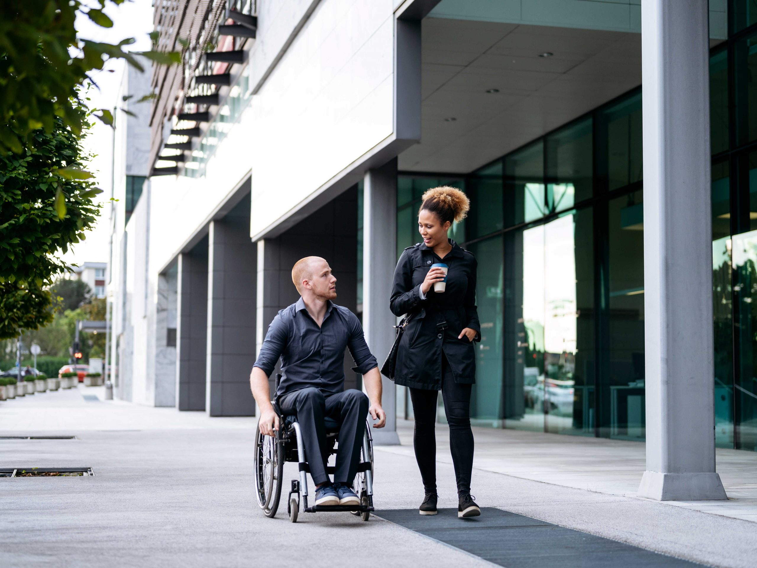 Two Friends Heading to Work Having a Chat