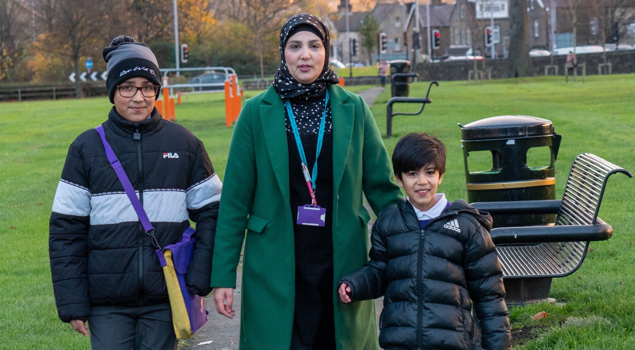 Family on their way to school.