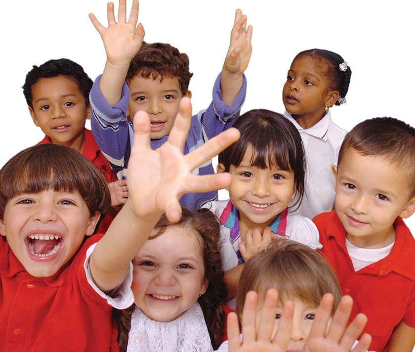 A group of children waving their arms and hands