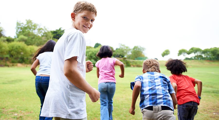 Group of kids lining up to race.