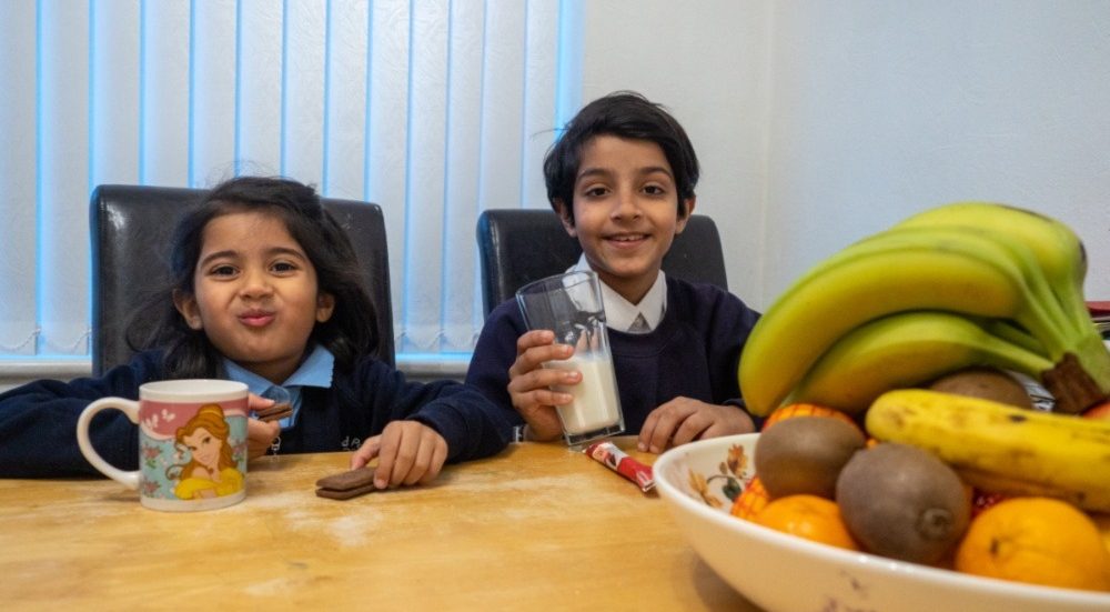 Children Eating Breakfast Before School