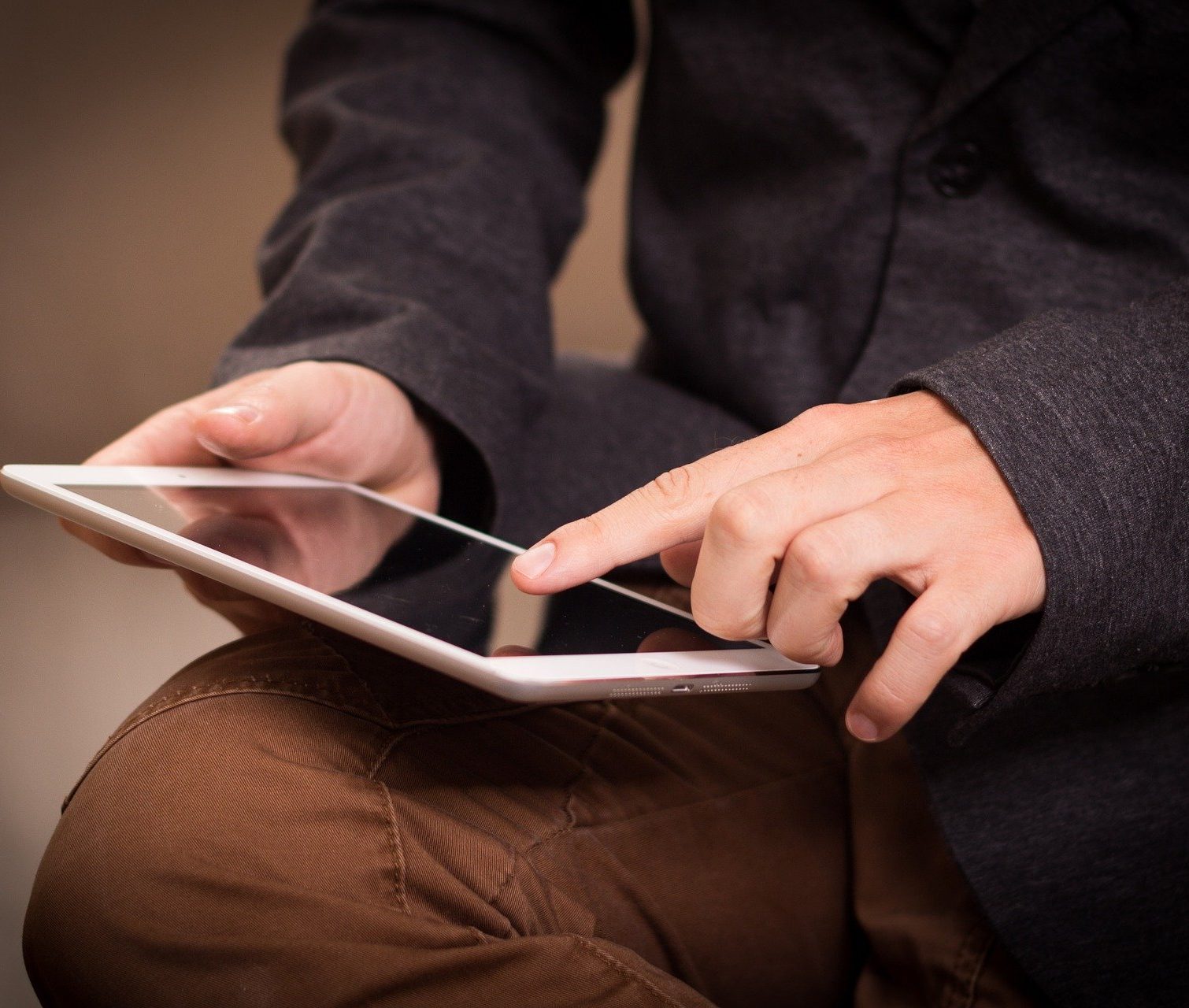 Man using a tablet device