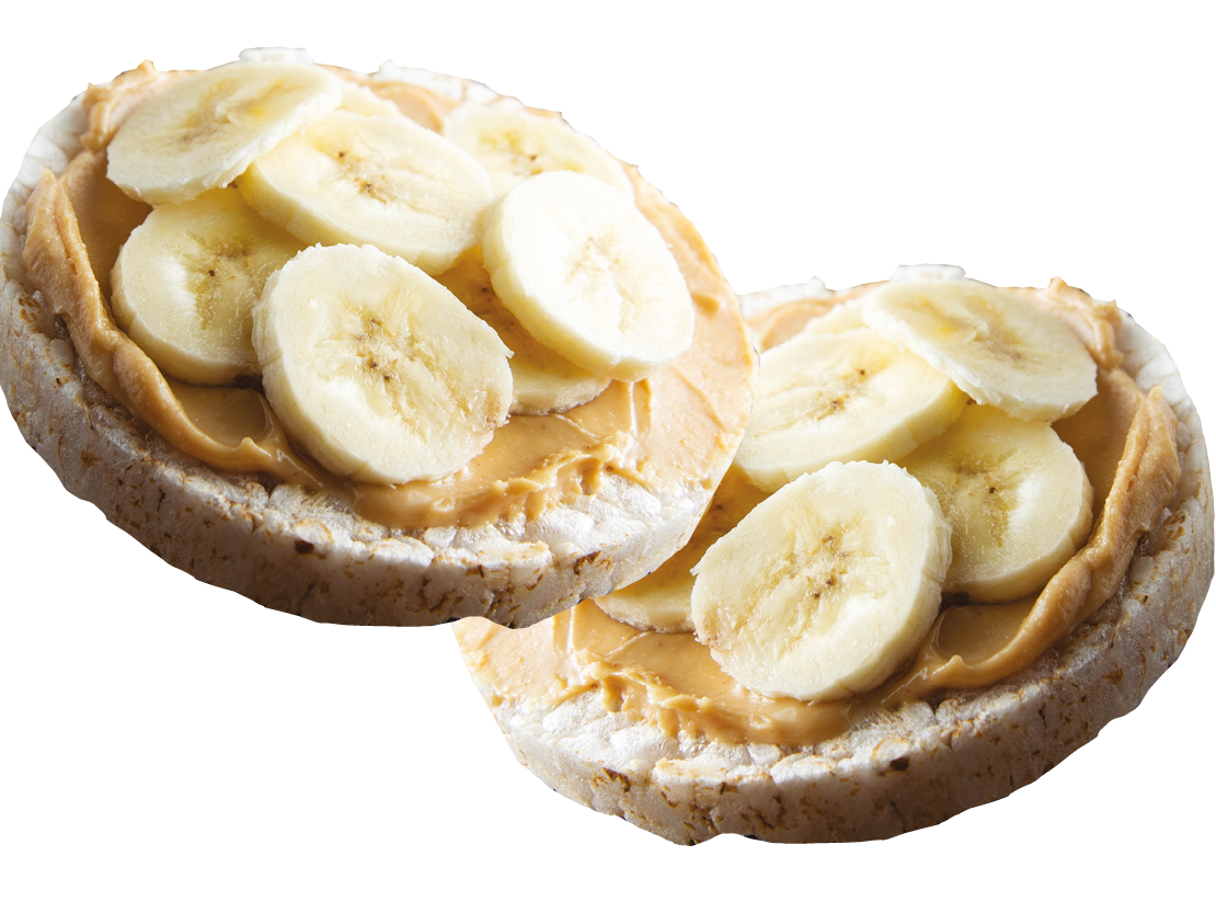Sliced banana and peanut butter on rice cake.