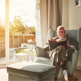 Man sitting at home relaxing in a calm space