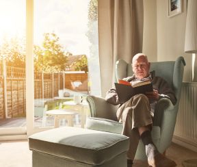 Man sitting at home relaxing in a calm space