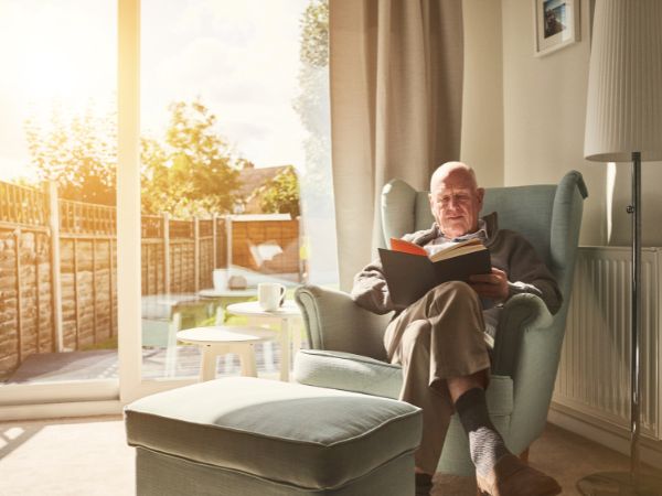 Man sitting at home relaxing in a calm space