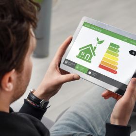 Man looking at home energy efficiency rating online