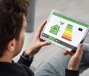 Man looking at home energy efficiency rating online