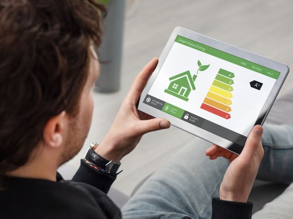 Man looking at home energy efficiency rating online