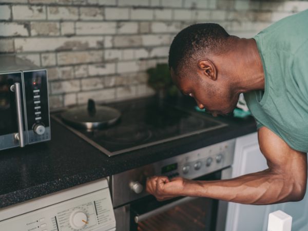 Man turning his cokoer off