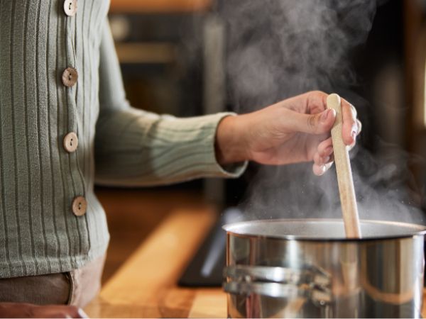 Someone making a hot meal
